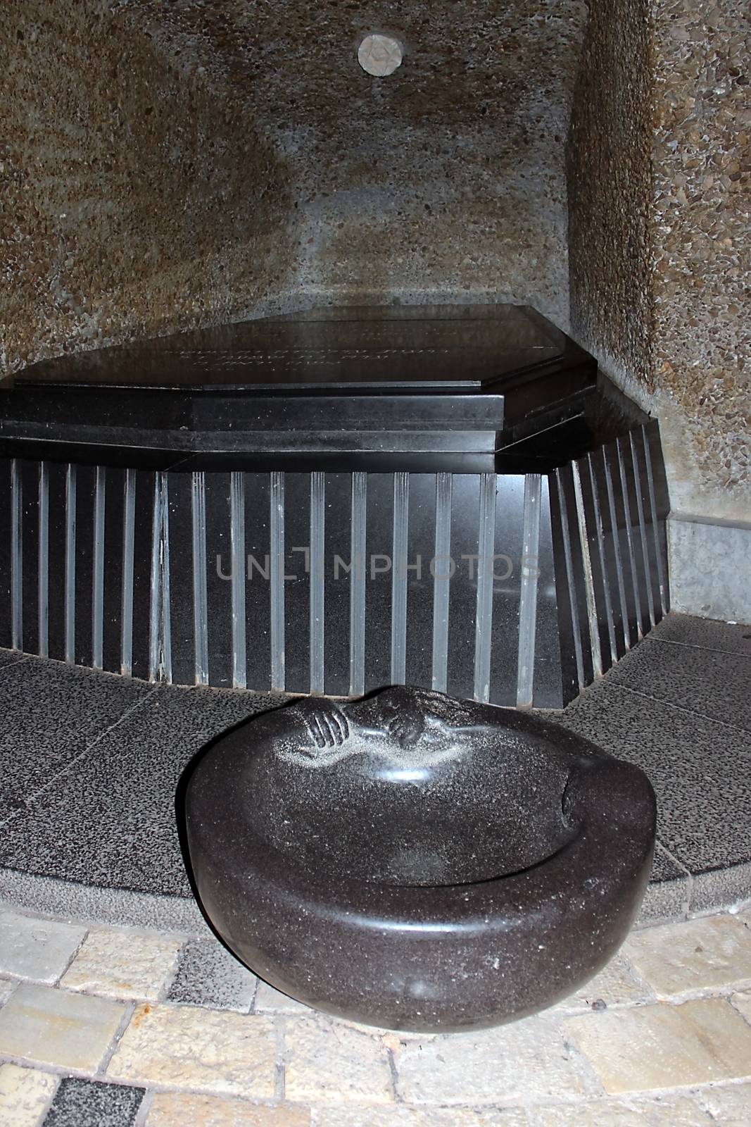 Ramat HaNadiv, Zichron Ya'akov, Israel - September 22: black granite tombstone in the family vault of Baron Rothschild, here are buried the Baron Edmond James de Rothschild and his wife Adelaide, September 22, 2014 in Zichron Ya'akov, Israel