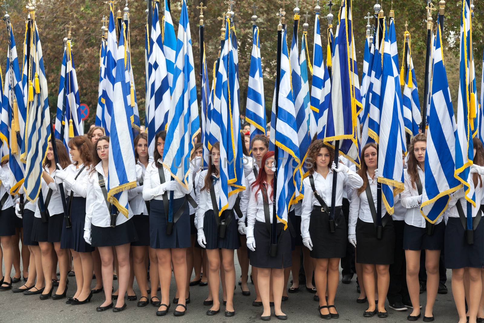 THESSALONIKI, GREECE - OCT 27:100th liberation anniversary from the City's 500 years Ottoman Empire Occupation; flown of the Greek flag on the White Tower on Oct 27, 2012 in Thessaloniki, Greece