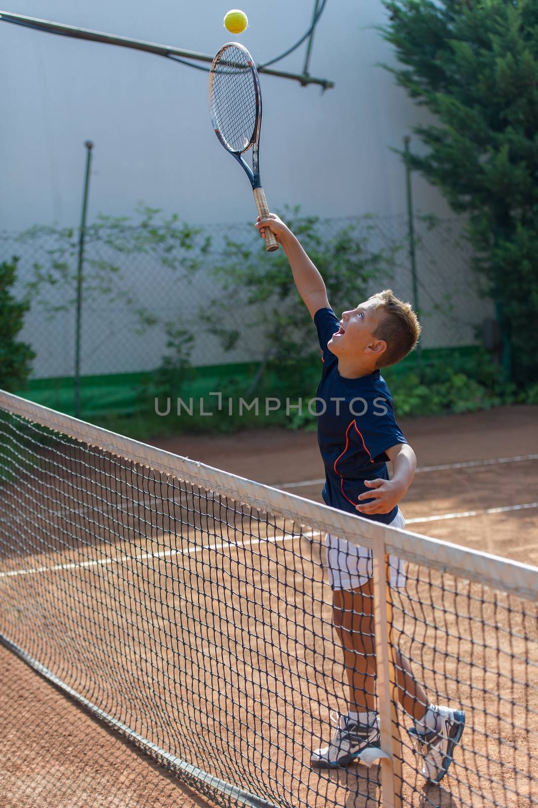 Children at school during a dribble of tennis