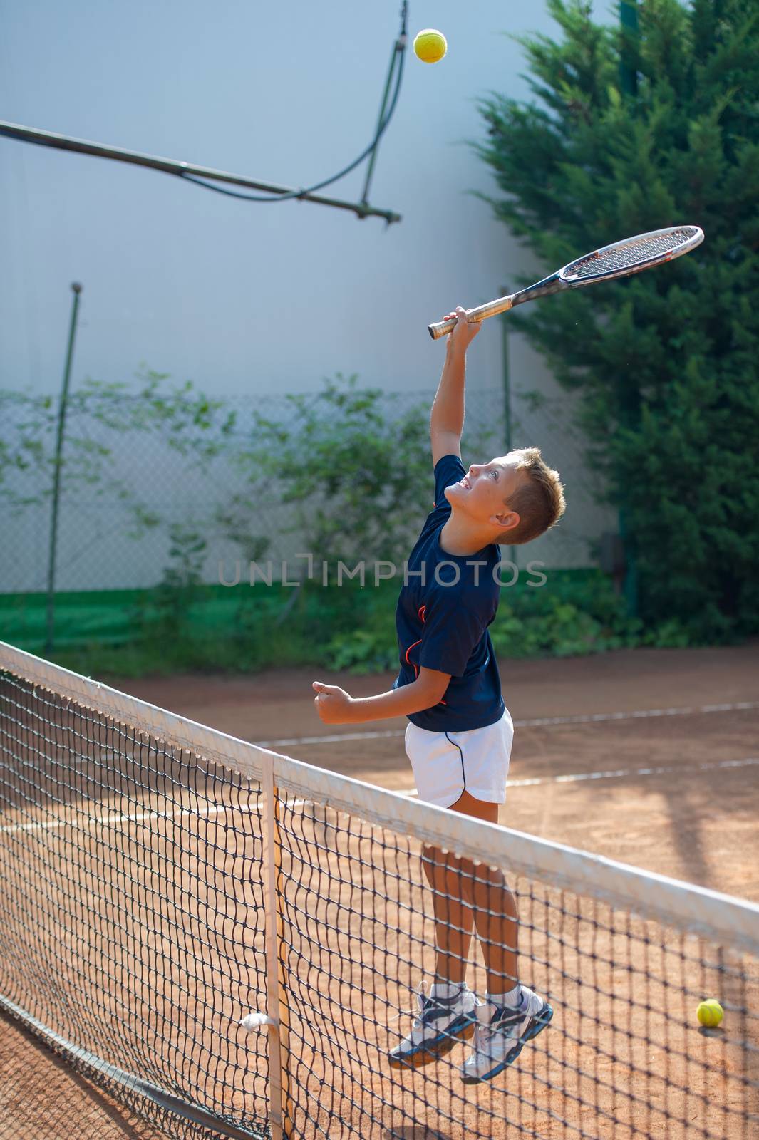 Children at school during a dribble of tennis