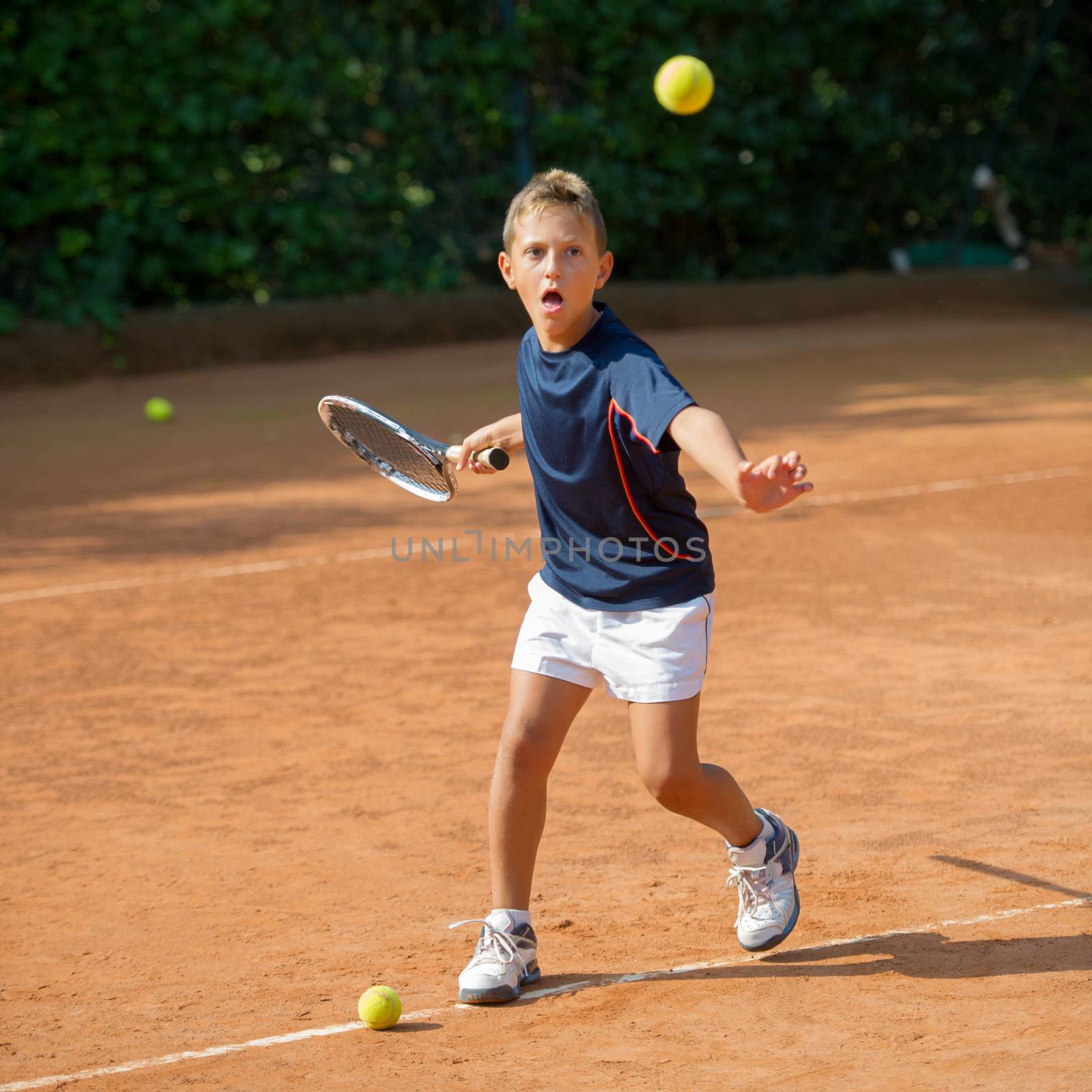 Children at school during a dribble of tennis