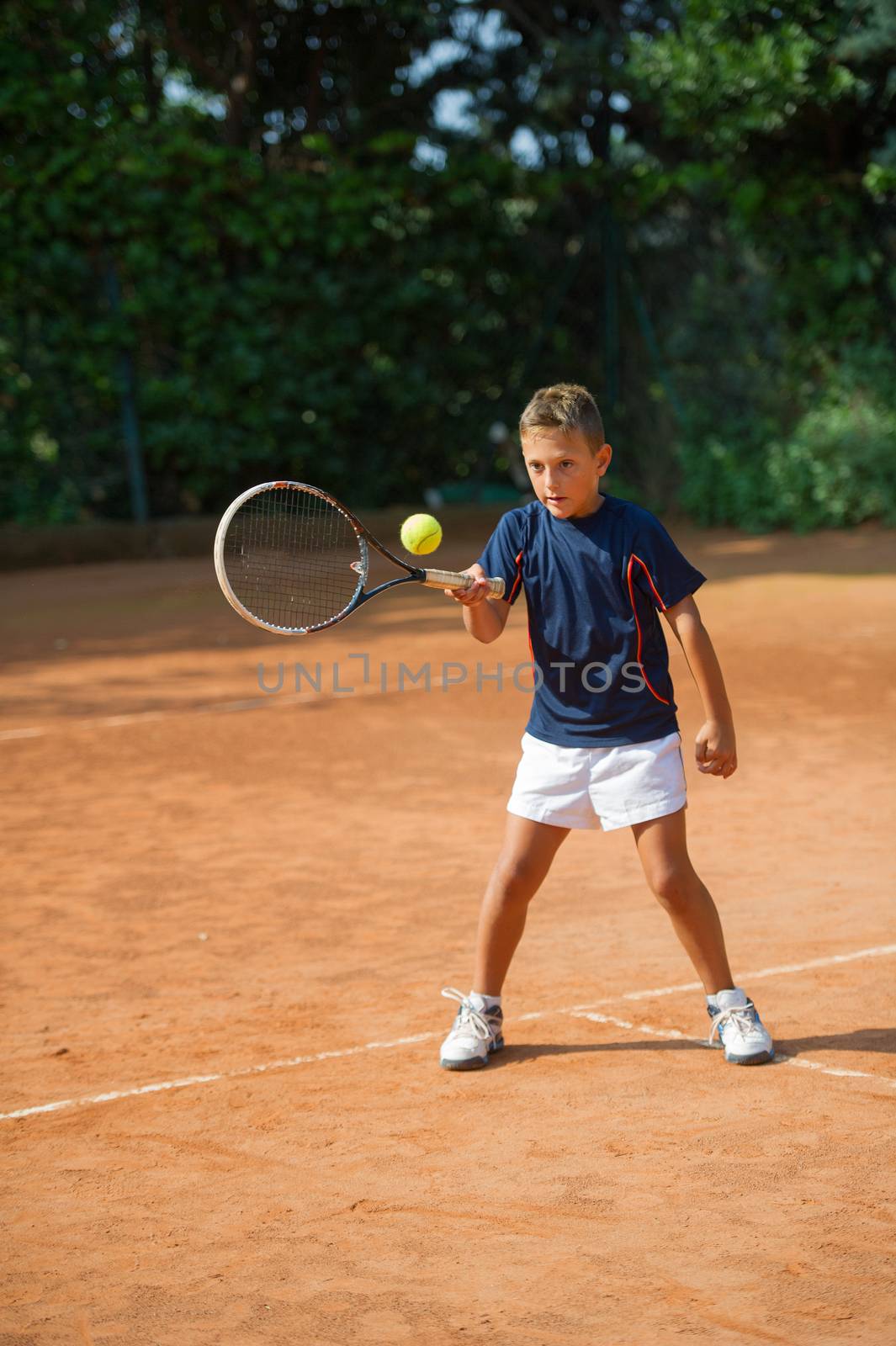 Children at school during a dribble of tennis