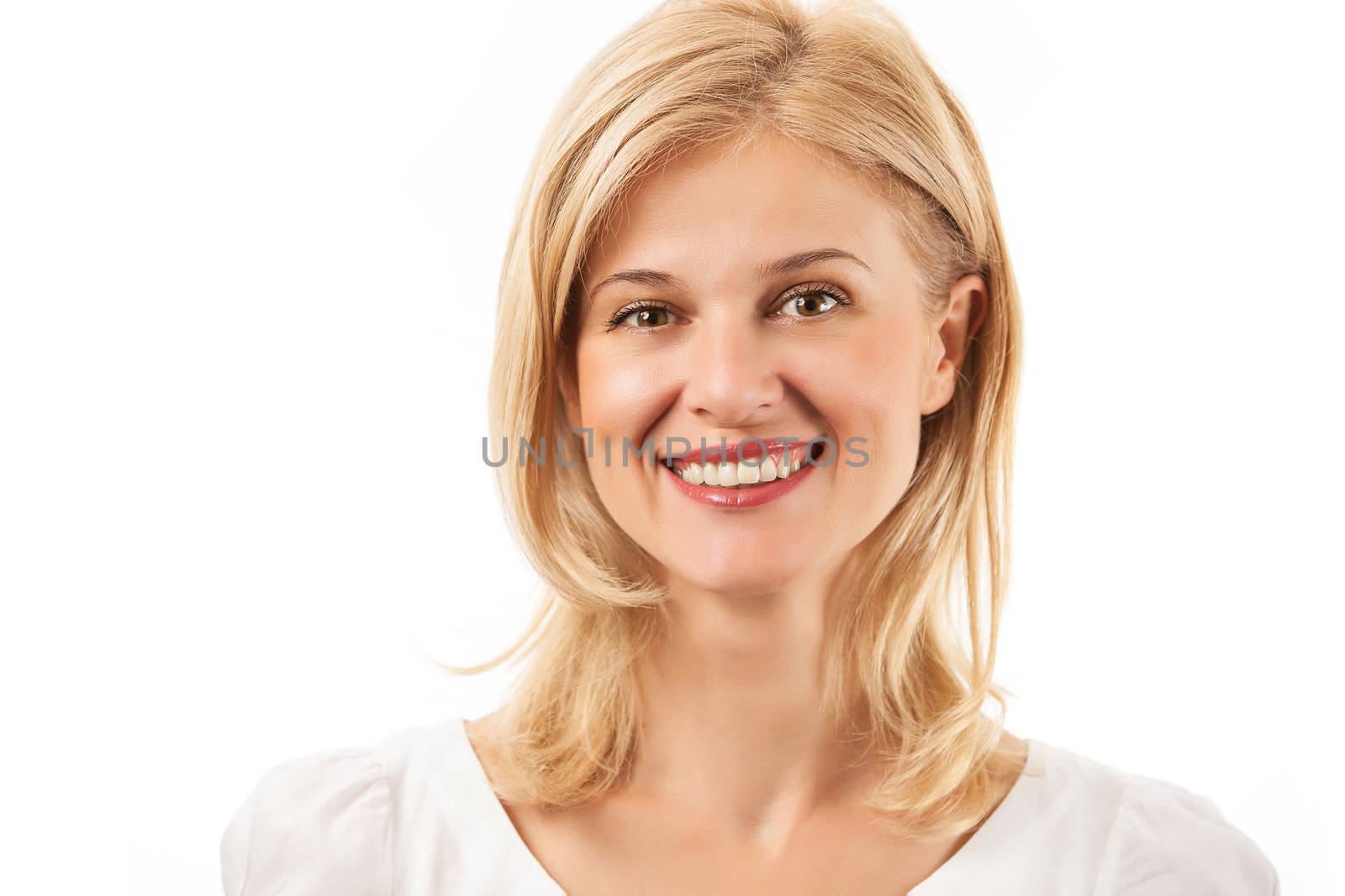 Happy young woman smiling over white background