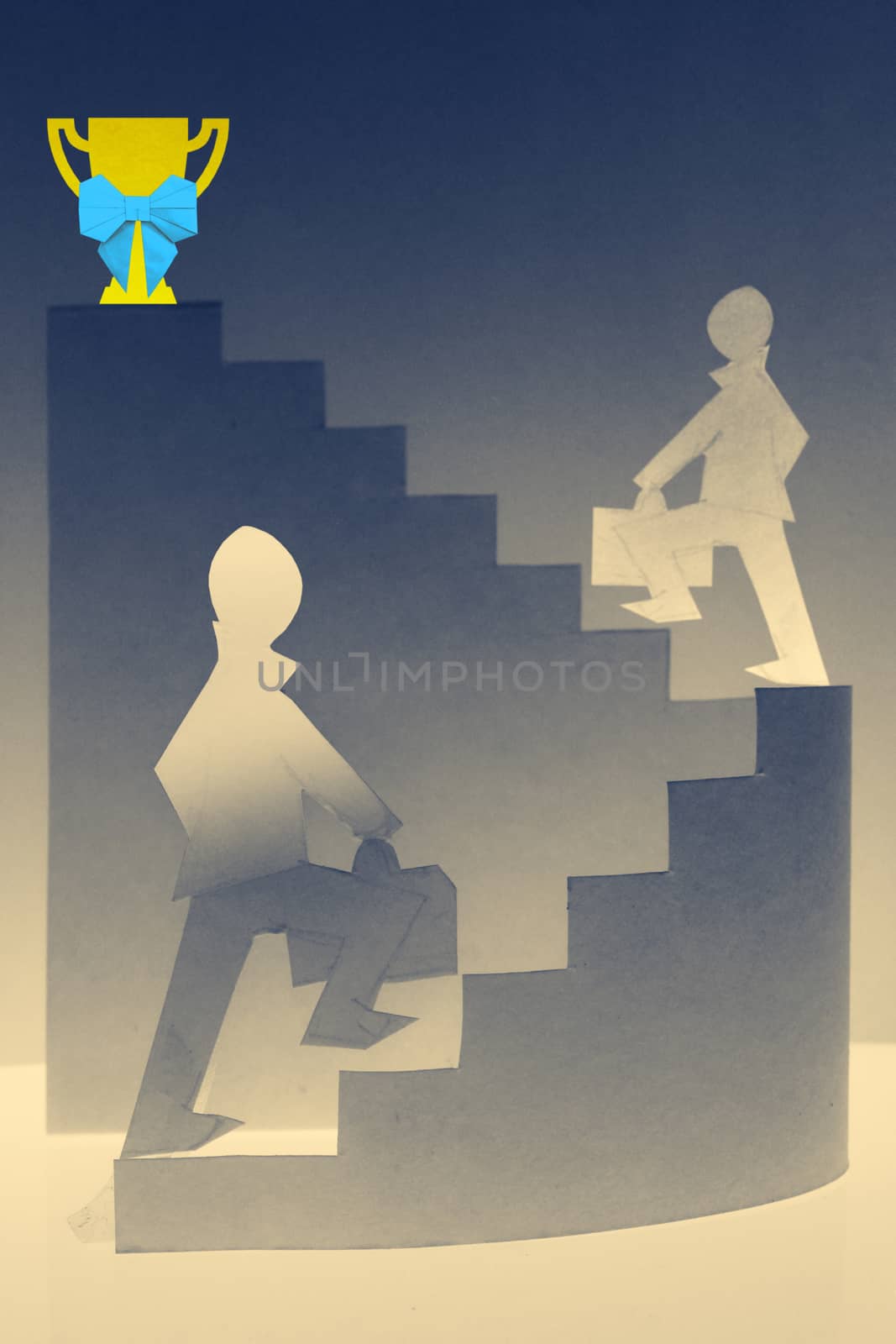 Businessman stepping up a staircase towards a Victory, Cup Winner Trophy by yands