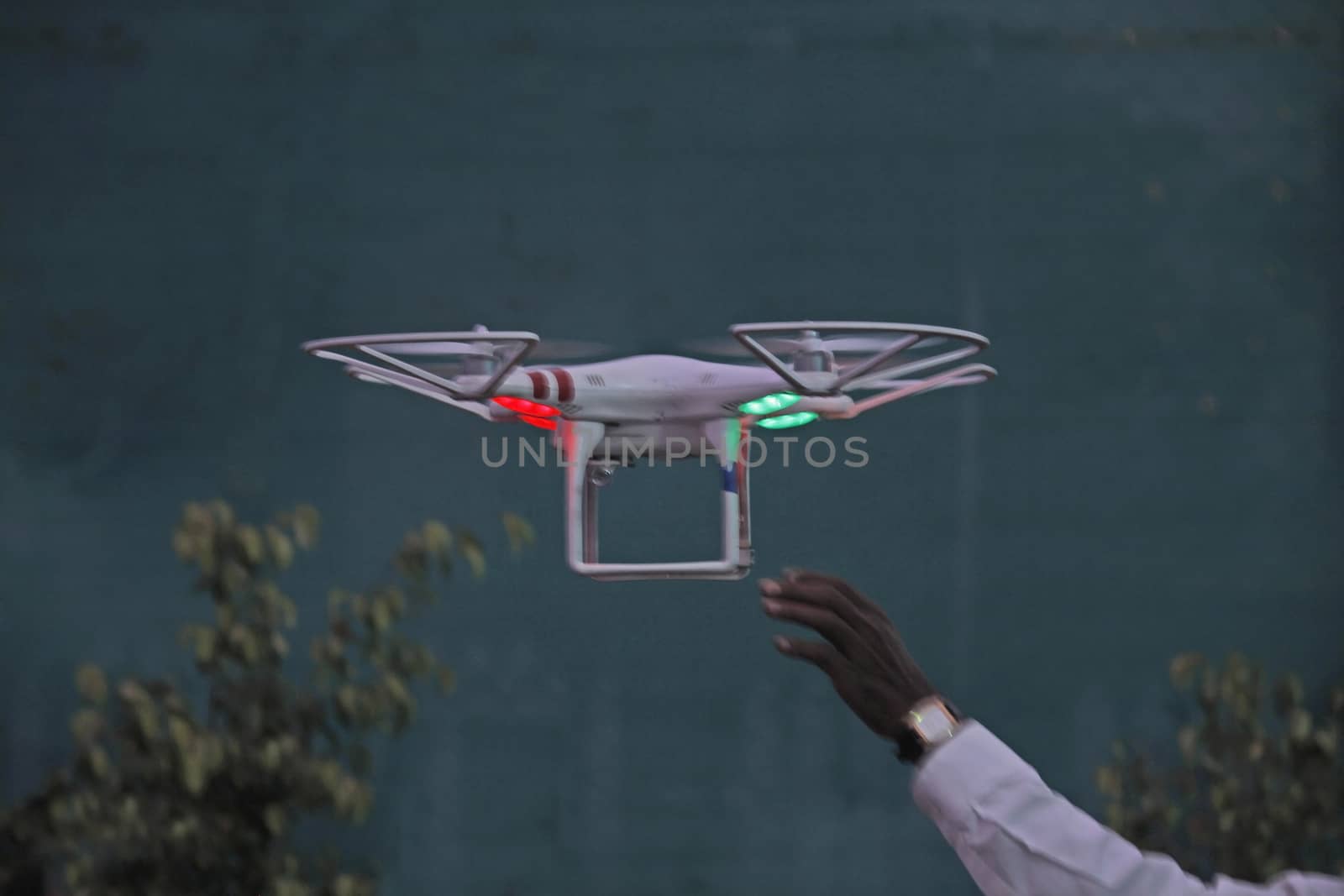 A quadcopter, also called a quadrotor helicopter, quadrotor is a multirotor helicopter that is lifted and propelled by four rotors. Quadcopters are classified as rotorcraft, as opposed to fixed-wing aircraft, because their lift is generated by a set of rotors (vertically oriented propellers).