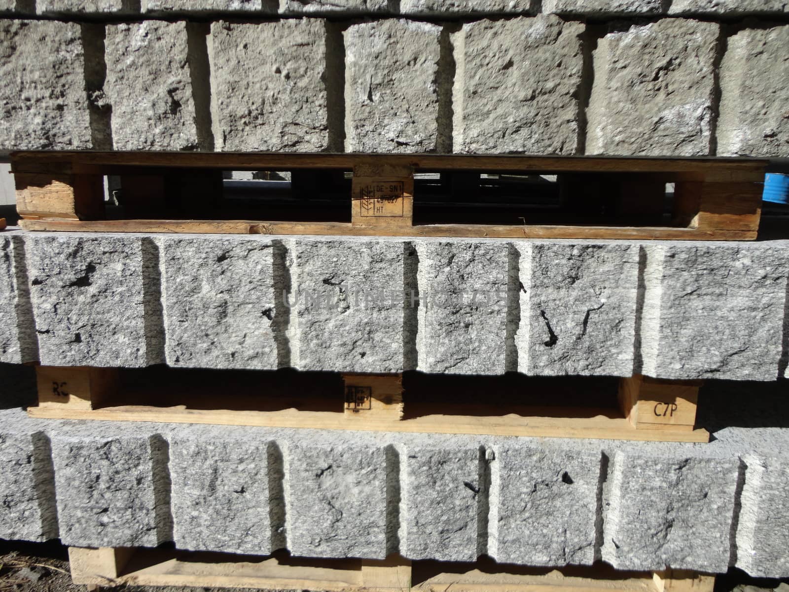 A manufactured industrial cutting of granite rock. Section View.