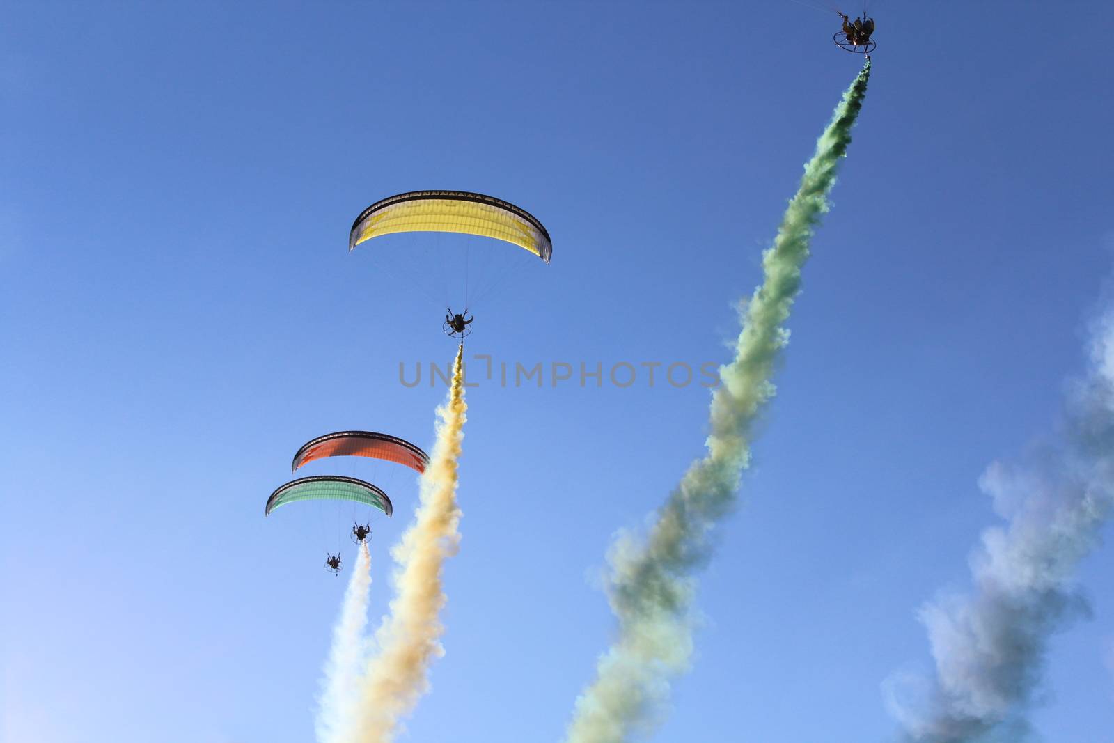 Some pilots, paragliders, make the spectacular perform