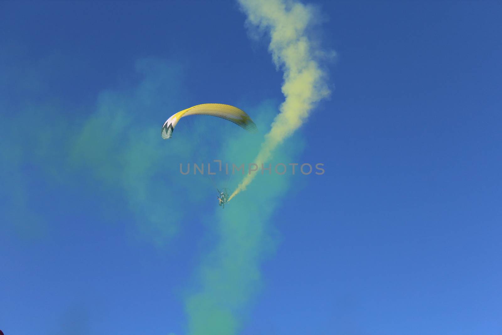 Some pilots, paragliders, make the spectacular perform