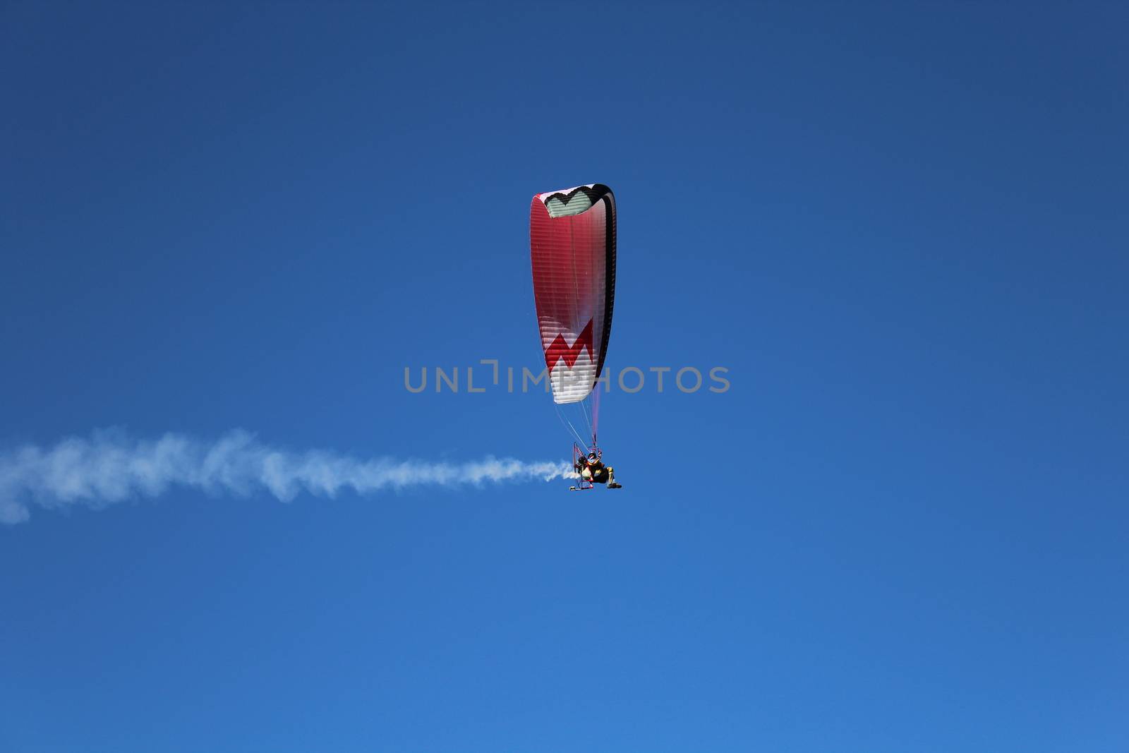 Some pilots, paragliders, make the spectacular perform