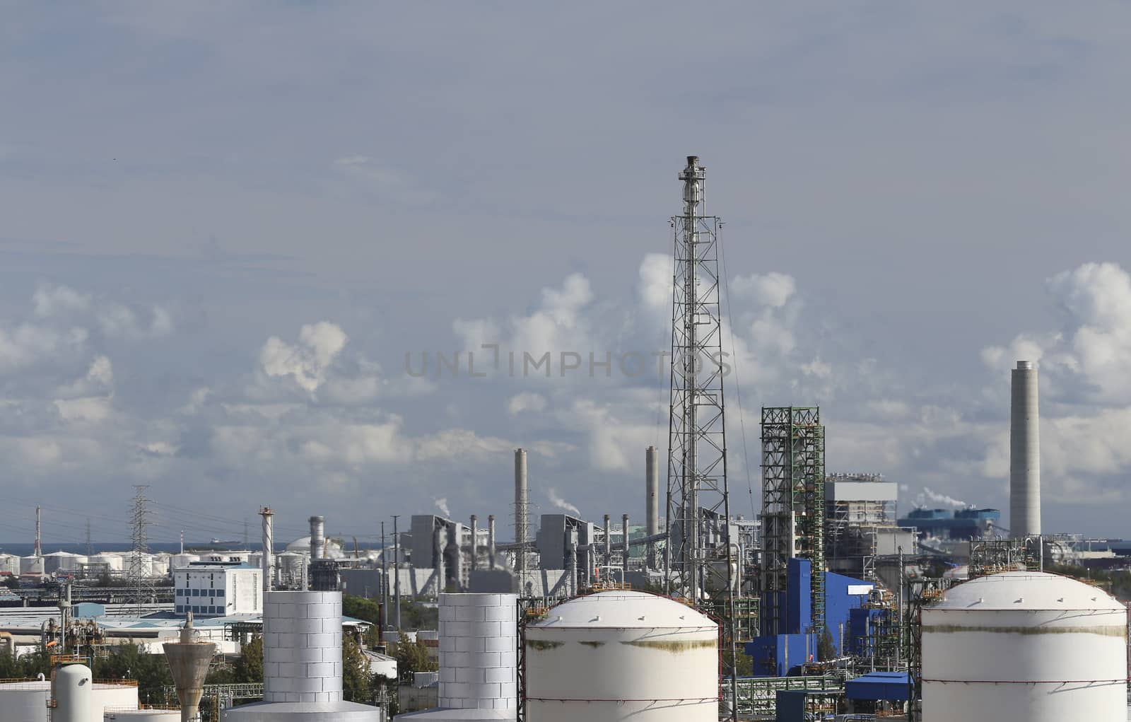 Oil and chemical area with cloud sky