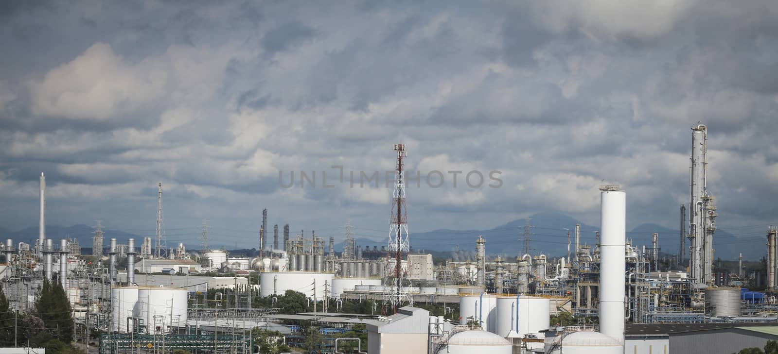 View of refinery industrial factory with cioud sky