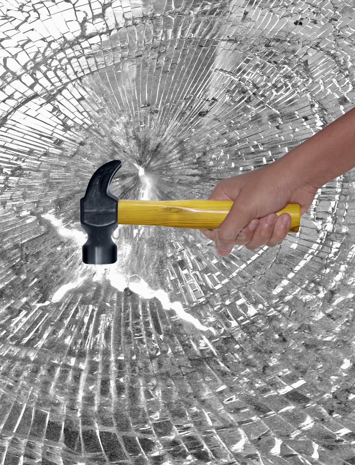 Hammer in Human Hand hitting Glass