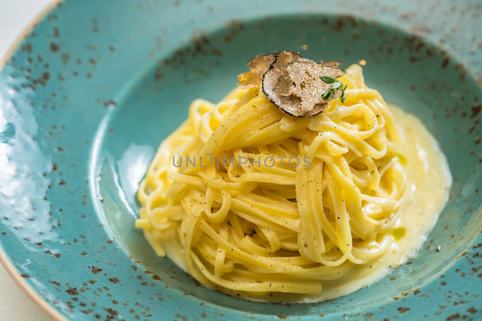 Dish of pasta with truffle. selective focus. close-up