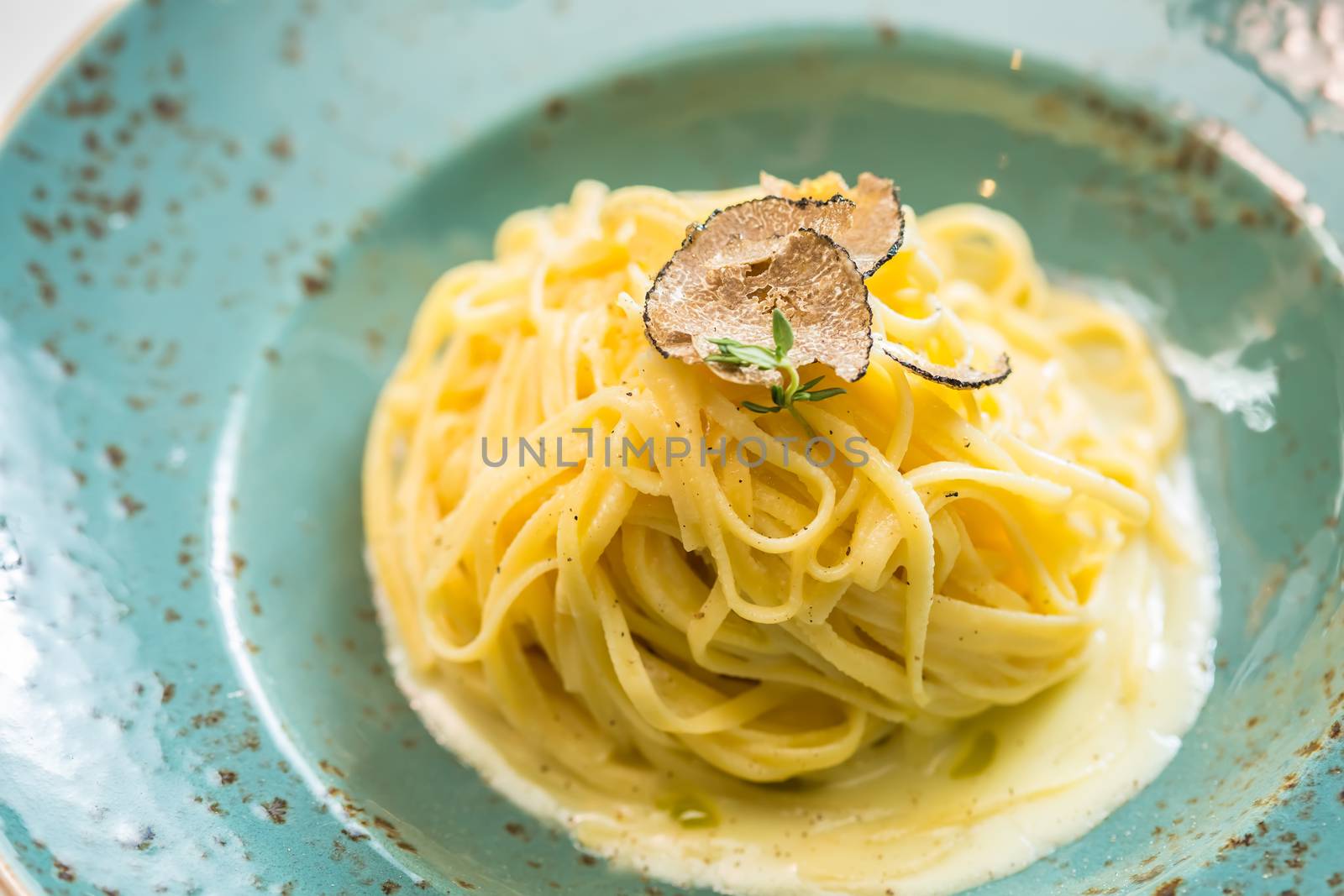 Dish of pasta with truffle. selective focus. close-up