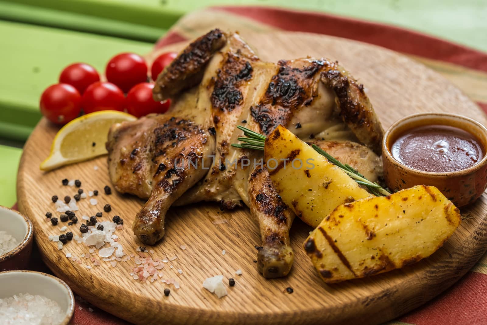 Grilled Chicken Plate in a restaurant. selective Focus