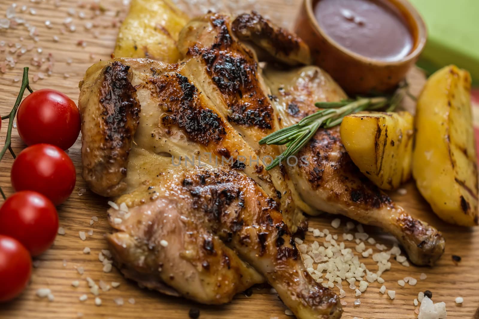 Grilled Chicken Plate in a restaurant. selective Focus