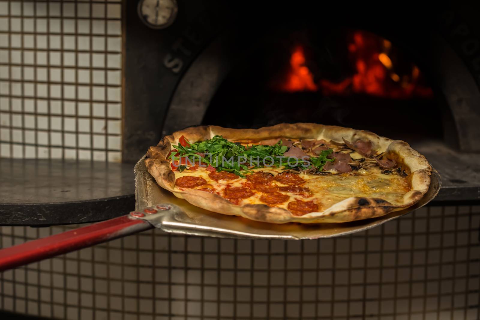 Delicious italian pizza served on table. selective focus
