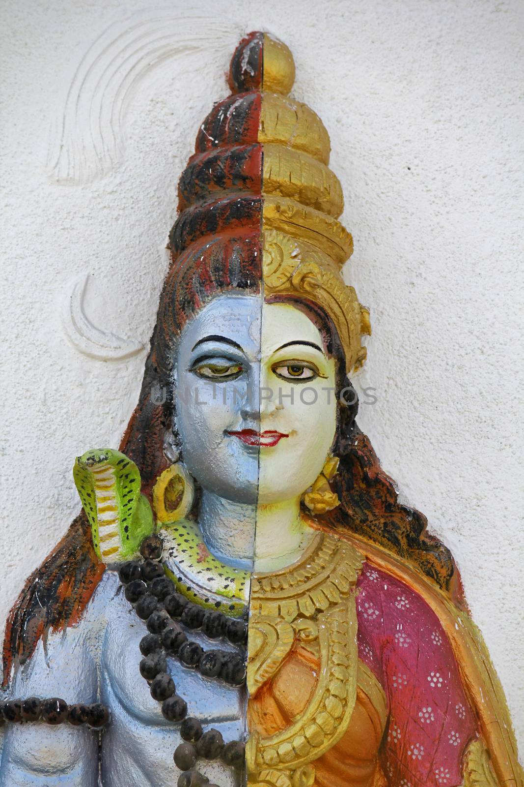 Statue of Ardhanari Nateshwar at Shrinath Mhaskoba Temple, Kodit, Sasvad, Maharashtra, India. Ardhanarishvara is a composite androgynous form of the Hindu god Shiva and his consort Parvati Ardhanarishvara is depicted as half male and half female, split down the middle. The right half is usually the male Shiva, illustrating his traditional attributes.