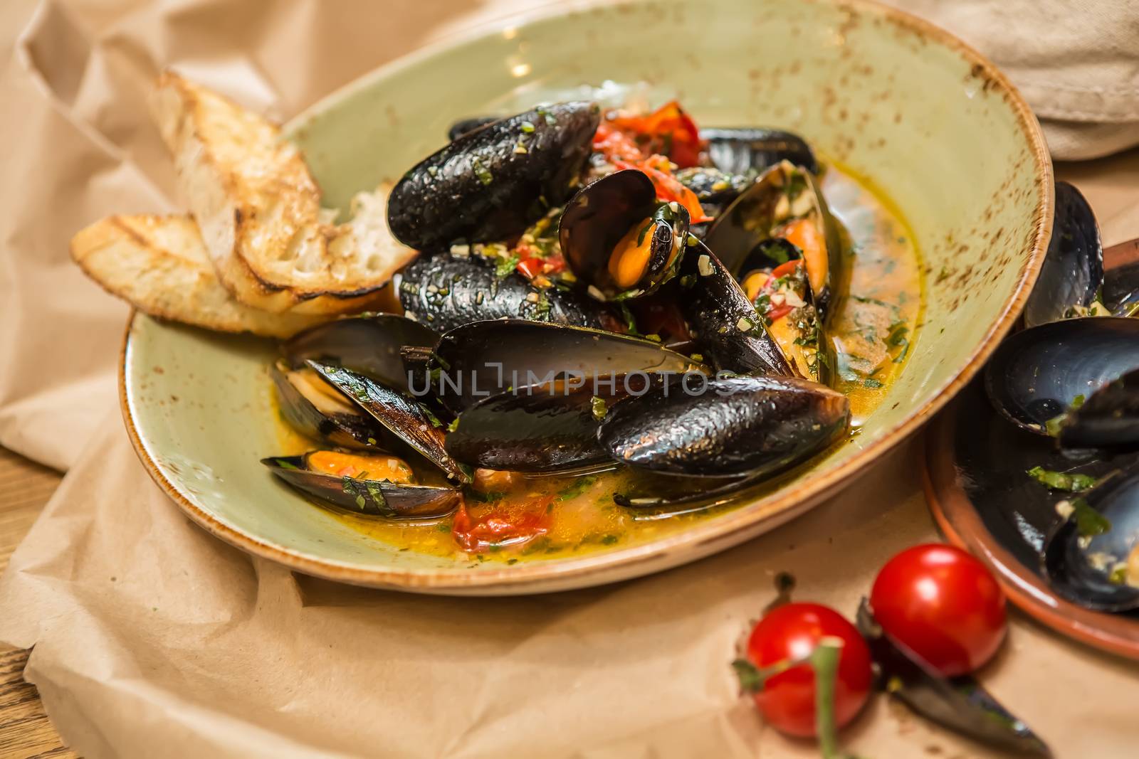 Moules Marinieres - Mussels cooked with white wine sauce. by sarymsakov