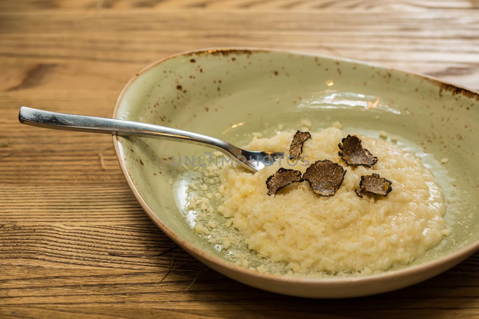 Italian risotto with black truffle by sarymsakov