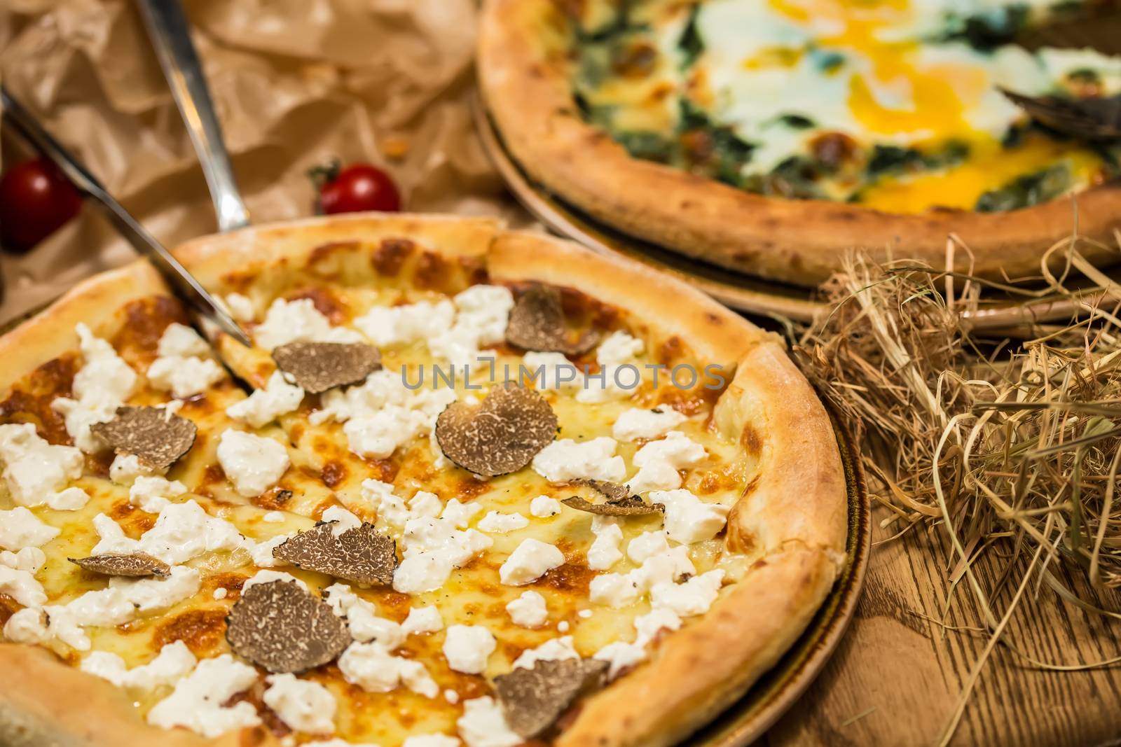 italian pizza with black truffles. Shallow dof.