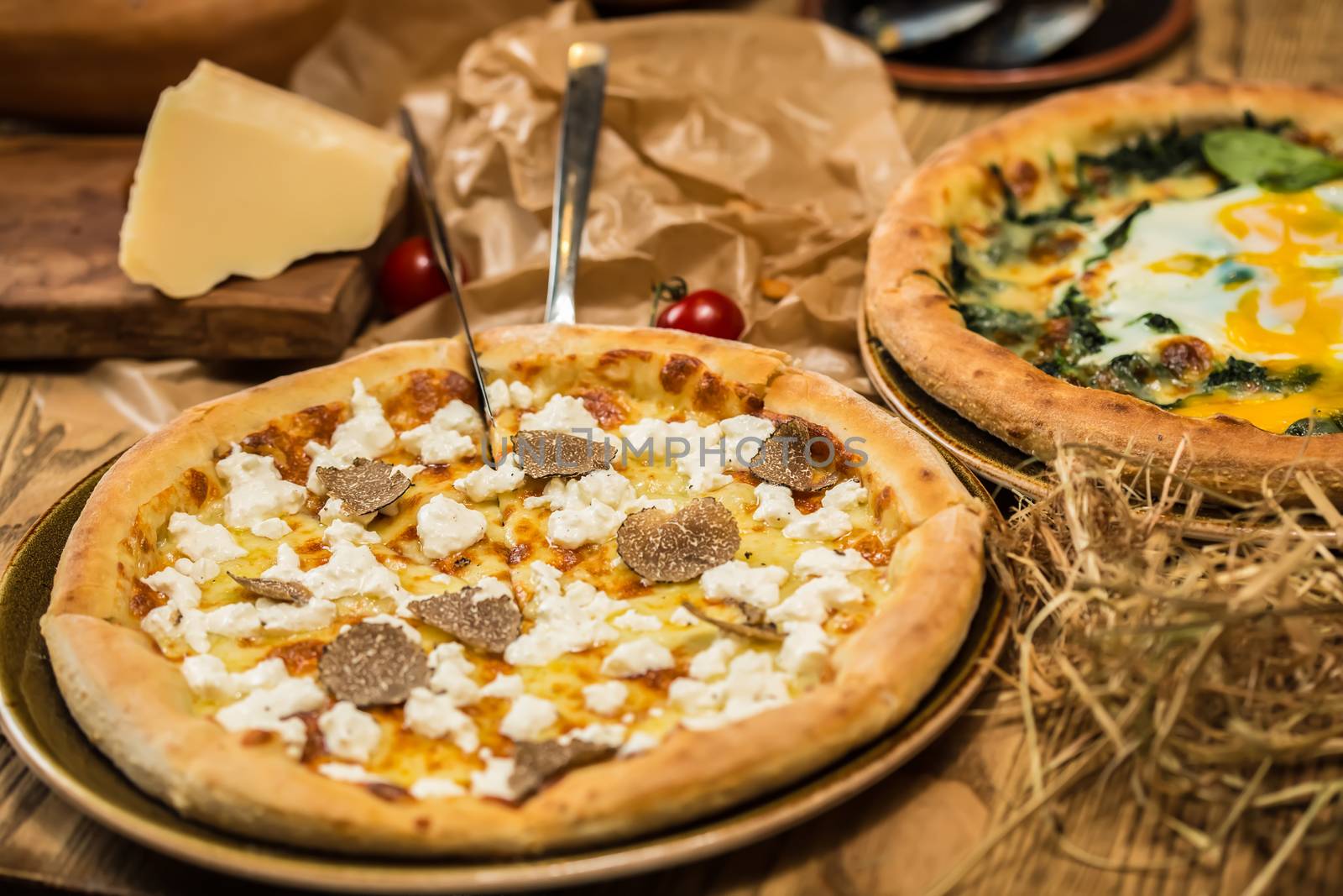 italian pizza with black truffles. Shallow dof.