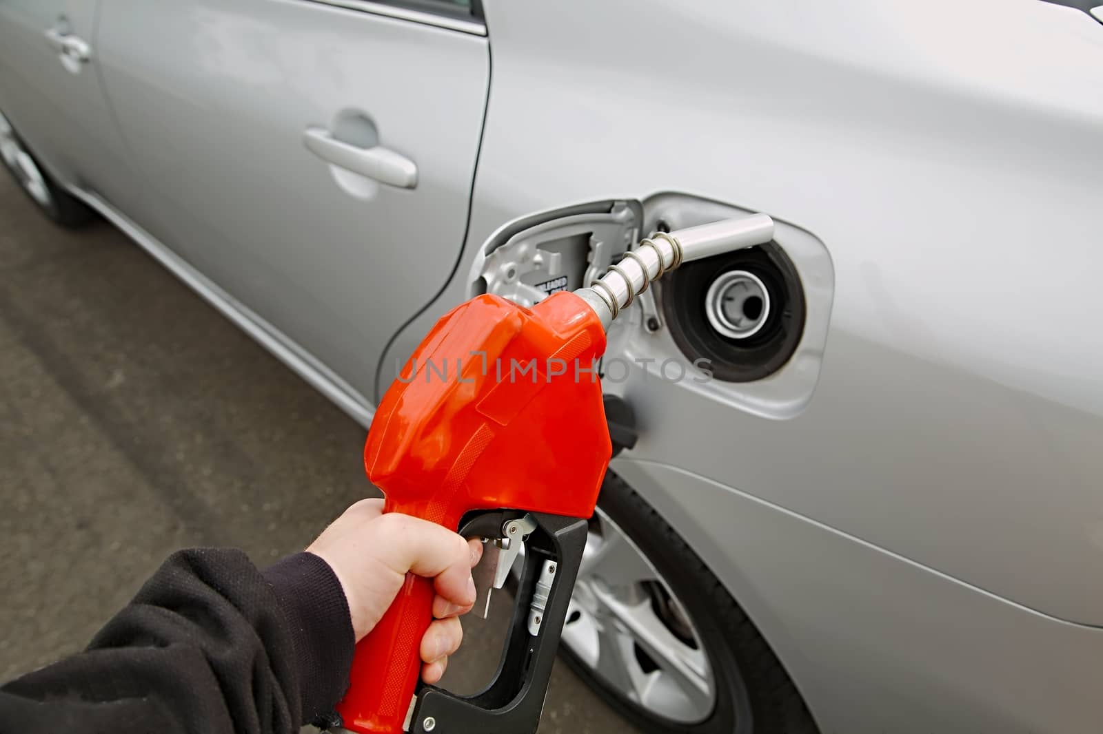 Fuel nozzle with hose isolated on white background