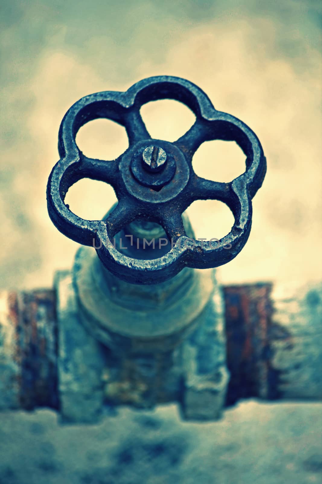 Revolving stop cock, tap of a water pipeline going to an overhead water storage on a building terrace,