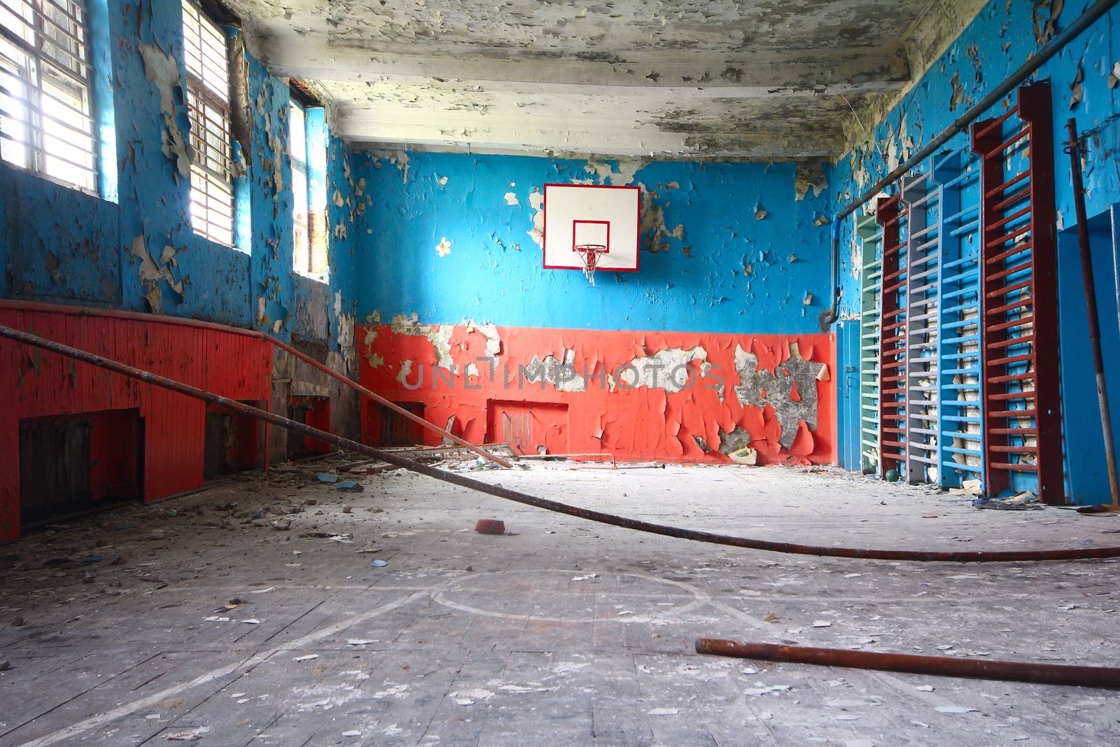 old sports hall at school with a basketball by max51288