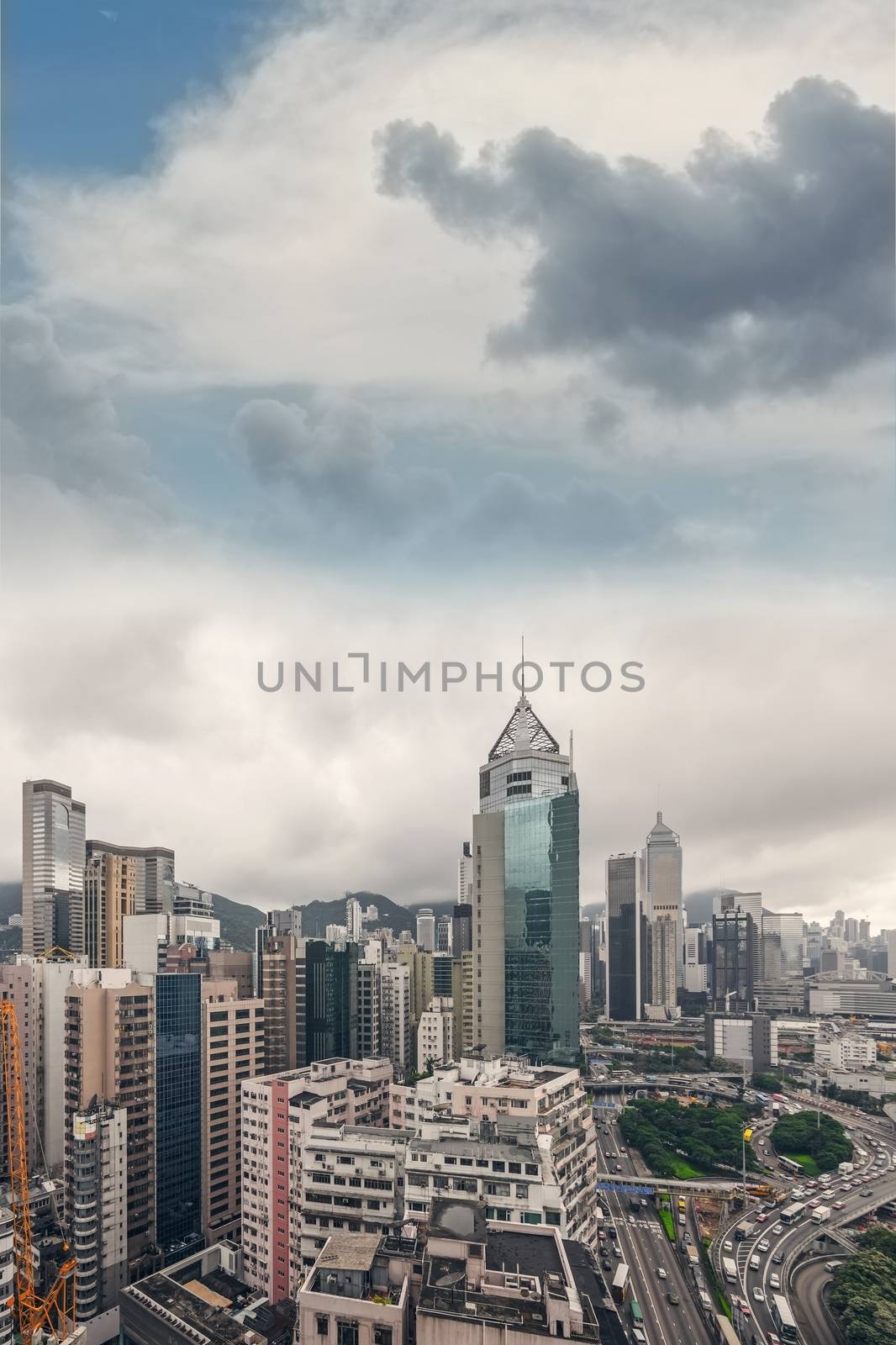Cityscape of Hong Kong with high buildings in daytime, high angle view.