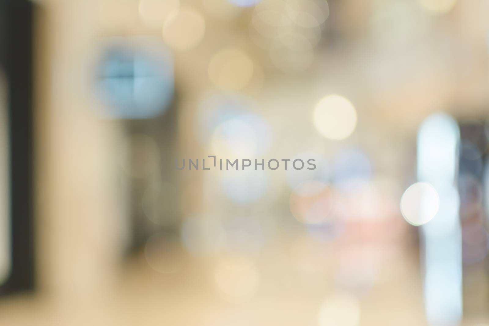 Abstract urban background with blurred buildings and street, shallow depth of focus.