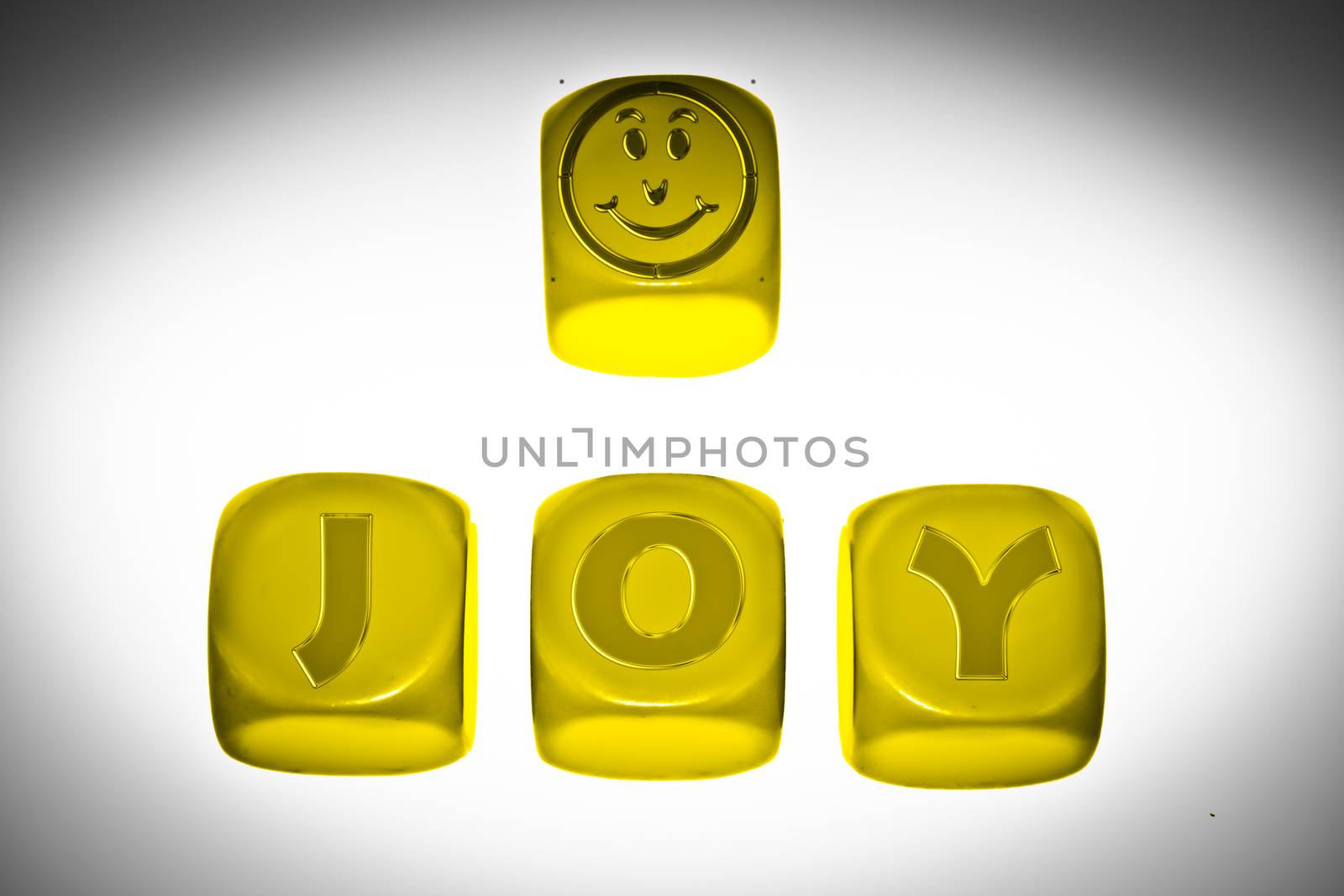 Joy symbol with word JOY on cubes
