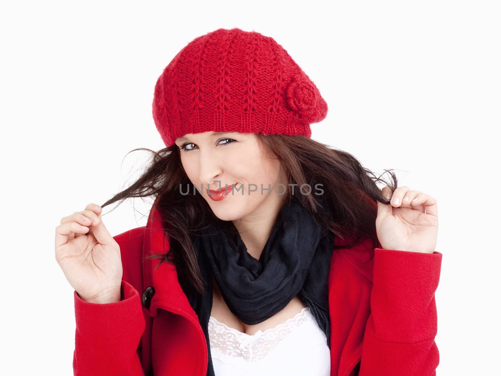 Young Woman in Red Coat and Cap Smiling - Isolated on White