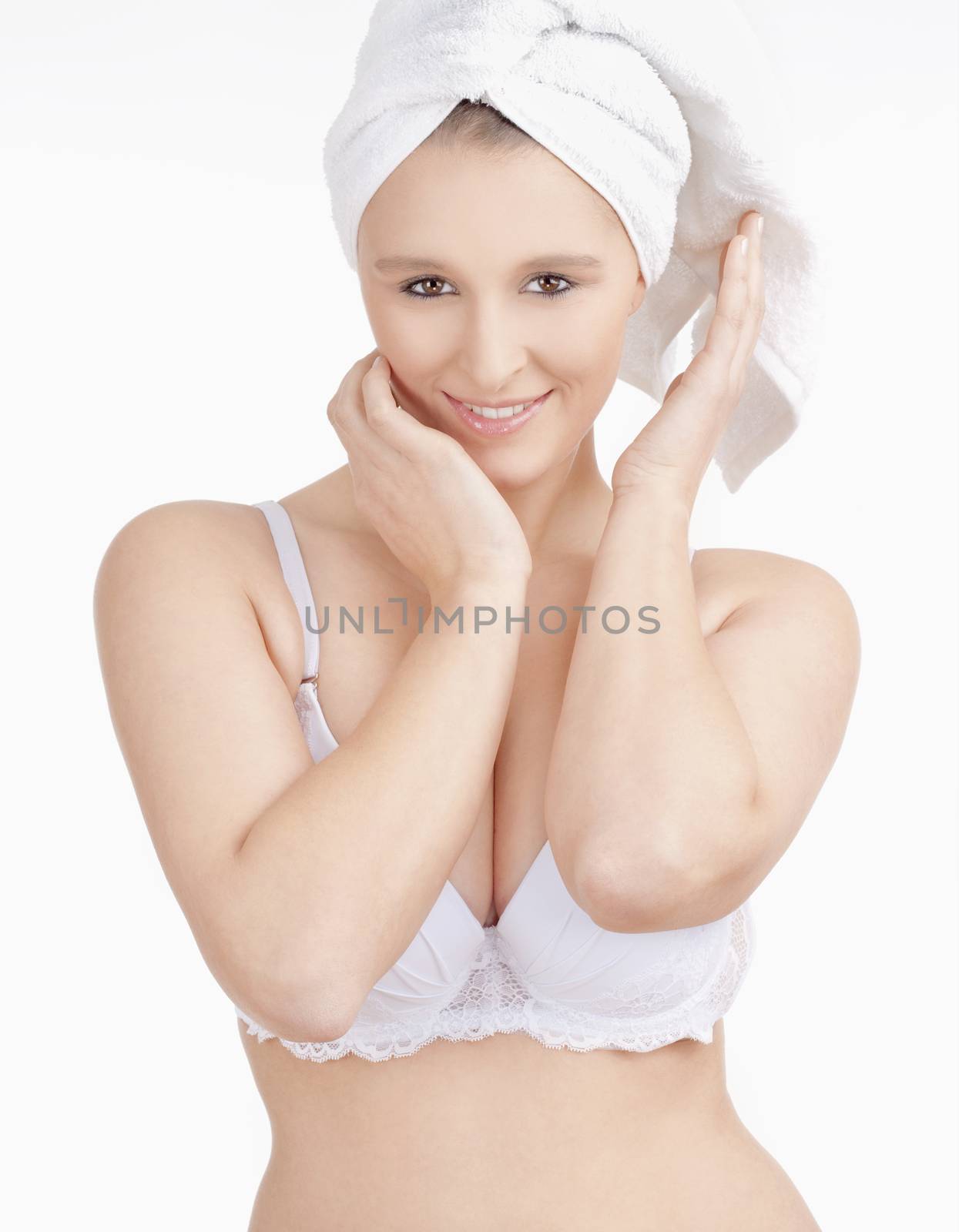 Beautiful Young Woman with Towel on her Head Smiling by courtyardpix