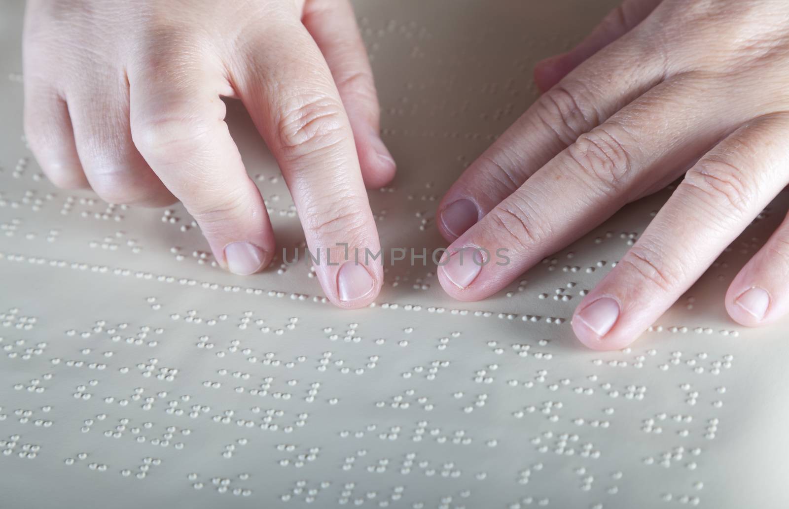 Blind reading text in braille language