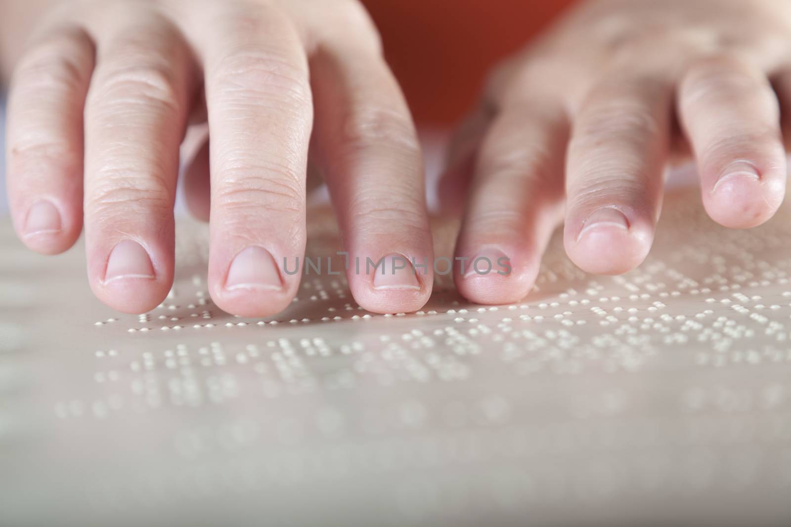 Blind reading text in braille language