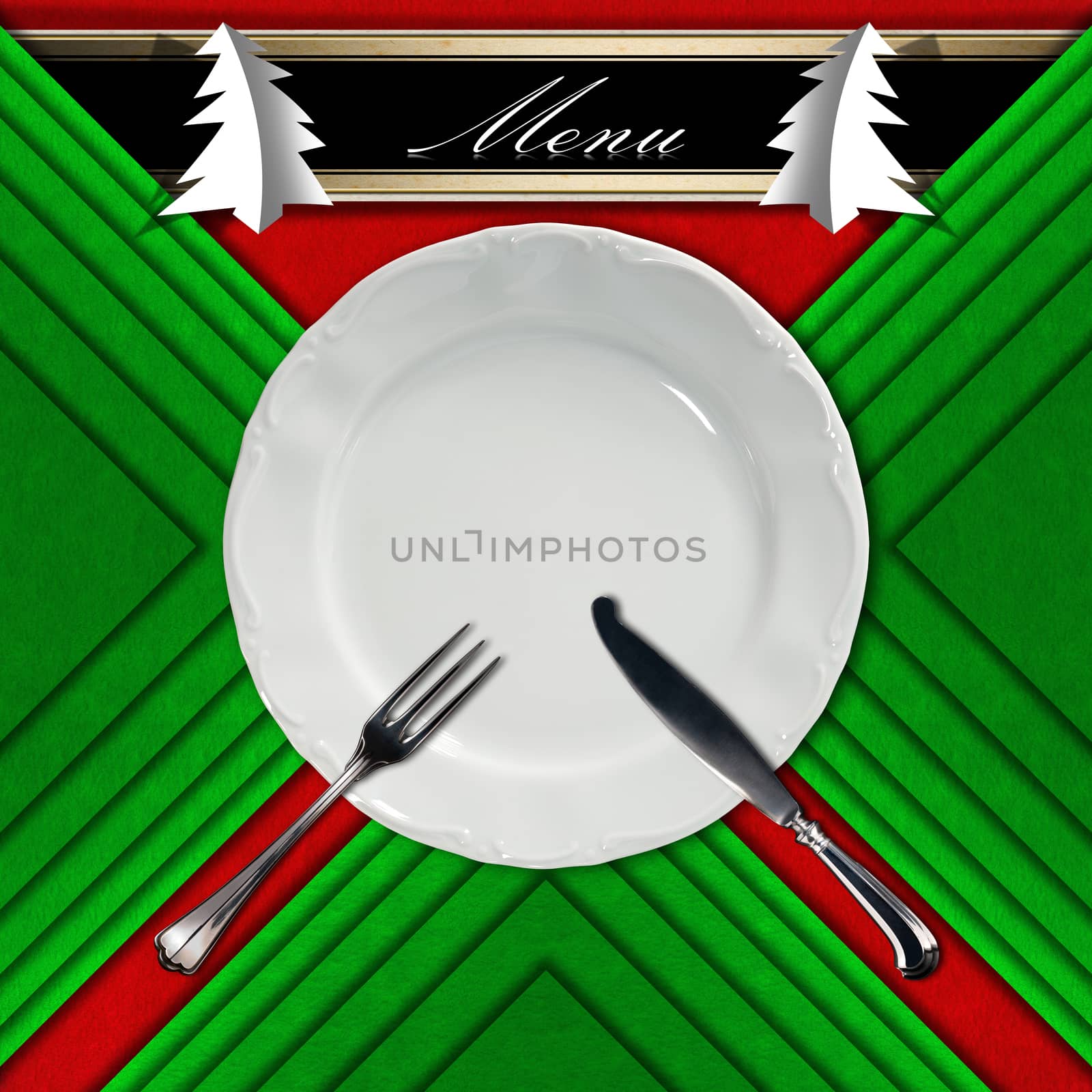 Red and green velvet background with horizontal band and written menu, empty white plate with silver cutlery and stylized Christmas trees with shadows. Template for a Christmas food menu