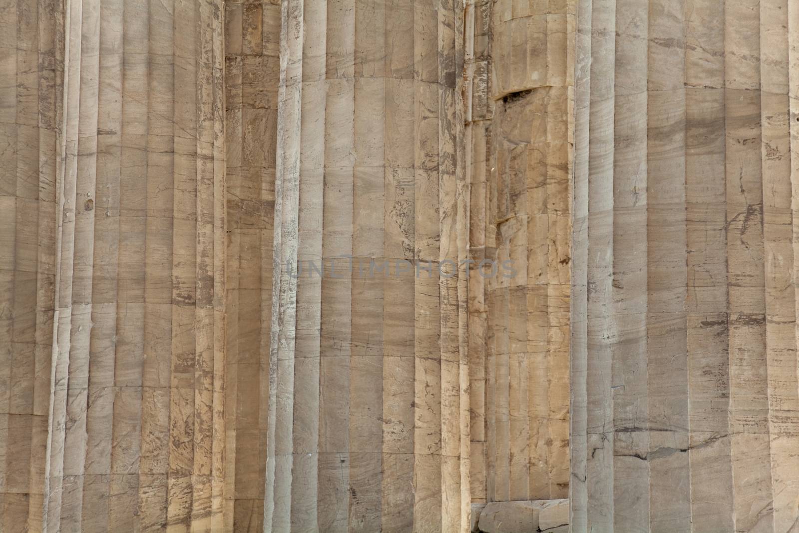 The Parthenon is a temple on the Athenian Acropolis, Greece, dedicated to the maiden goddess Athena, whom the people of Athens considered their patron deity. Its construction began in 447 BC when the Athenian Empire was at the height of its power. It was completed in 438 BC, although decoration of the building continued until 432 BC.