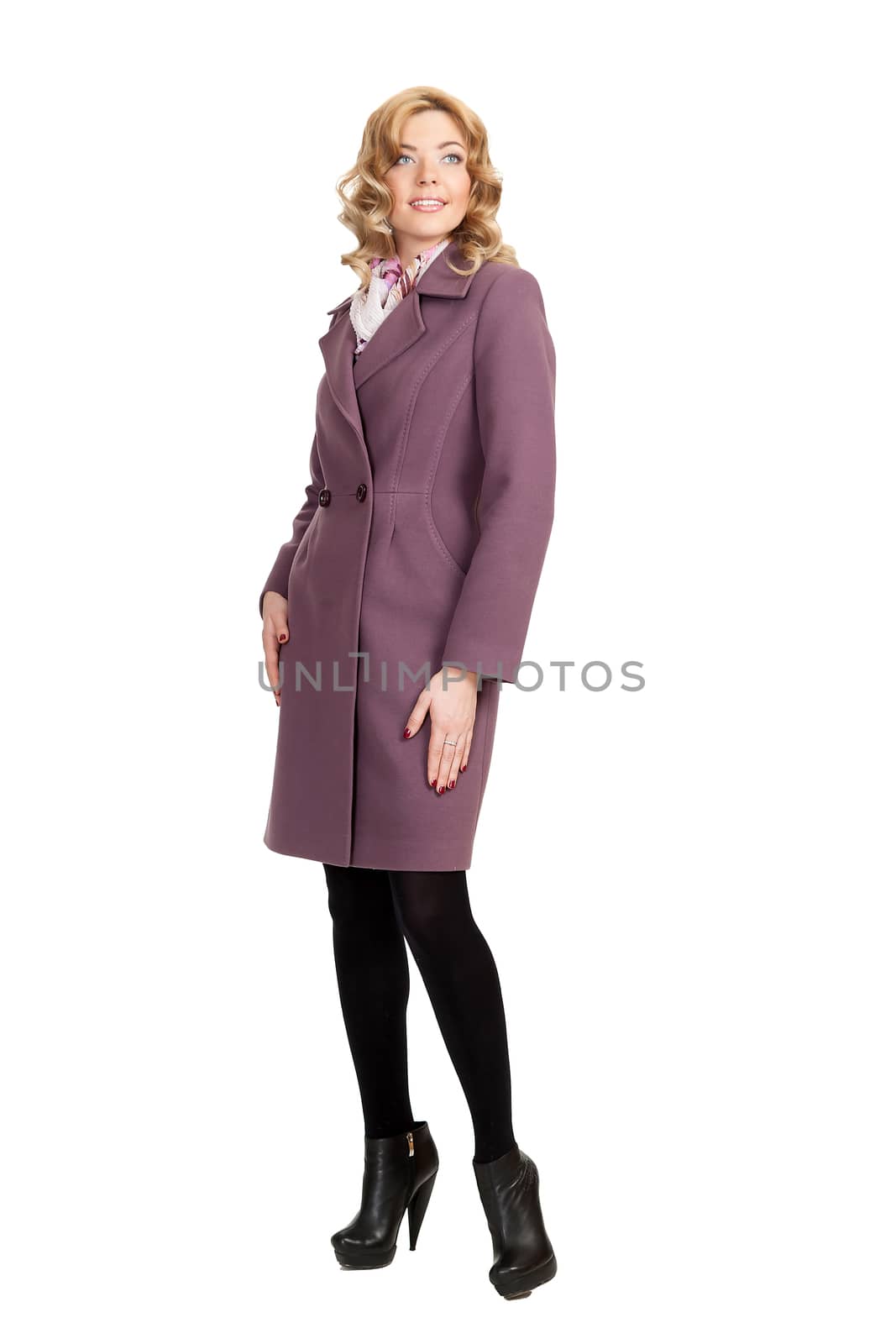 The girl in a violet  autumn coat on a white background