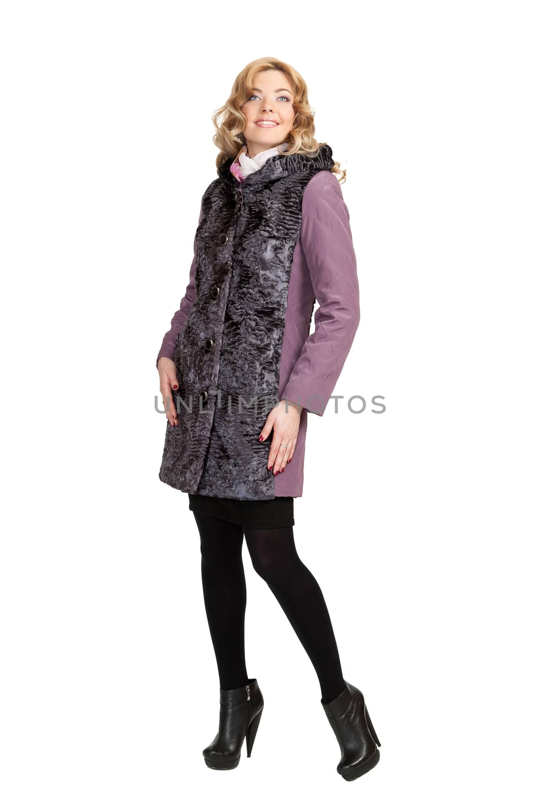 The girl in a violet  autumn coat on a white background