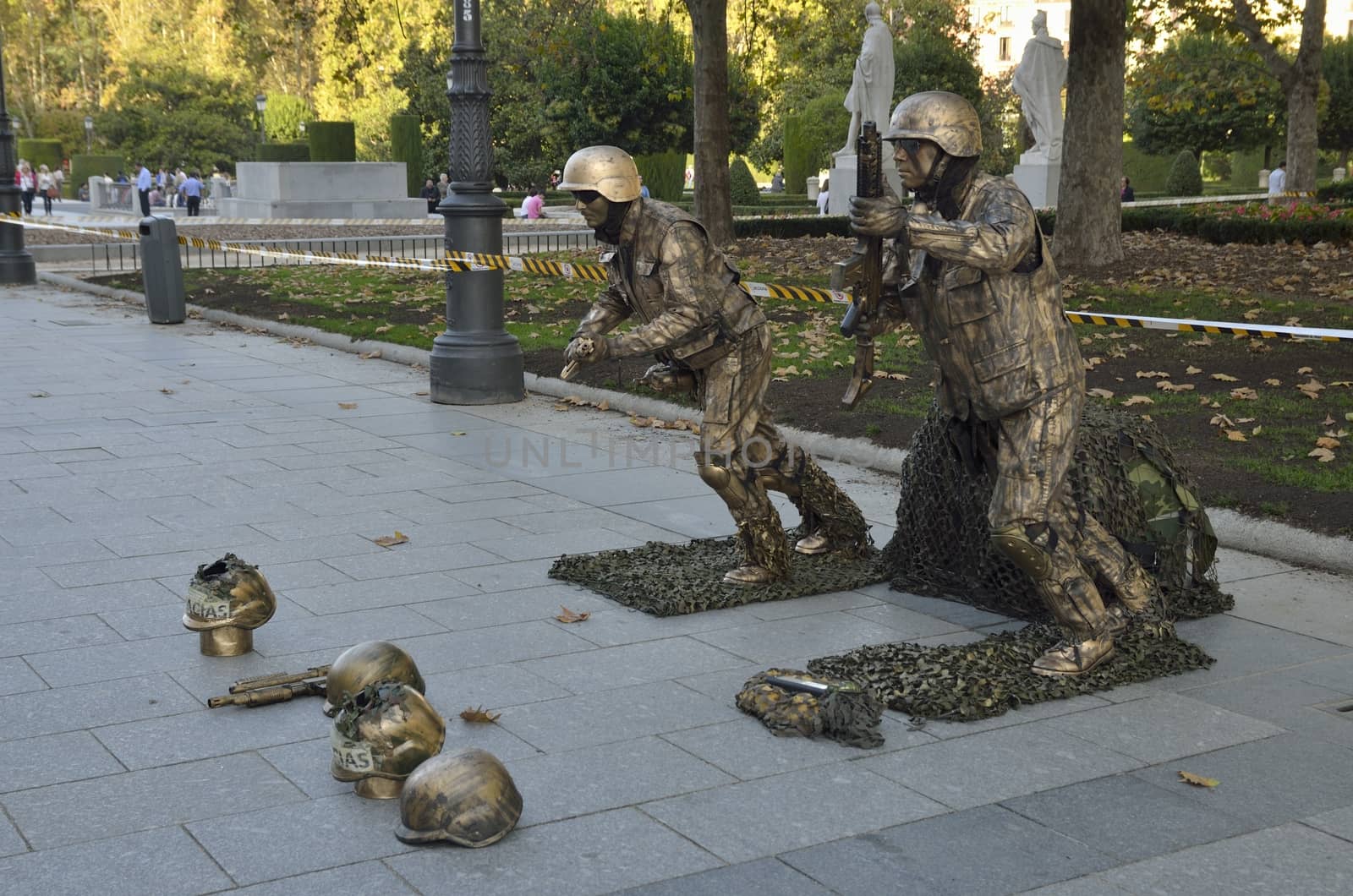 Human statues dressed as soldiers in Plaza of Oriente, Madrid, Spain.