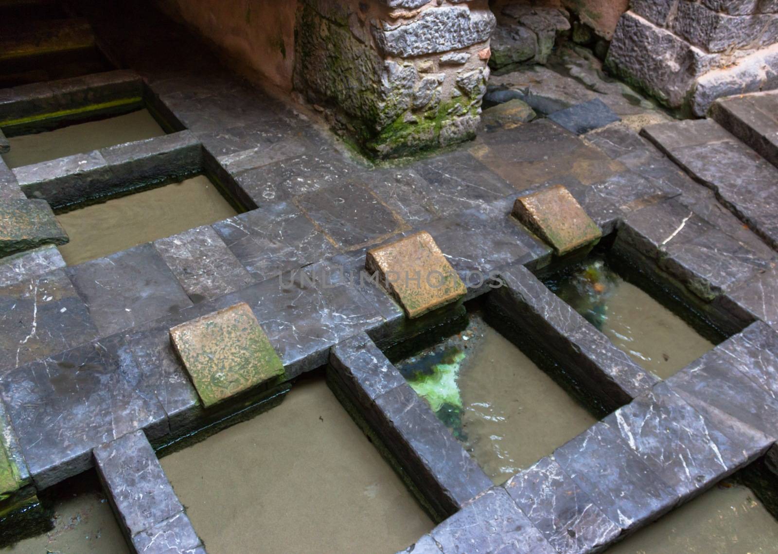 The public wash known as medieval wash-house, is located within the old city walls