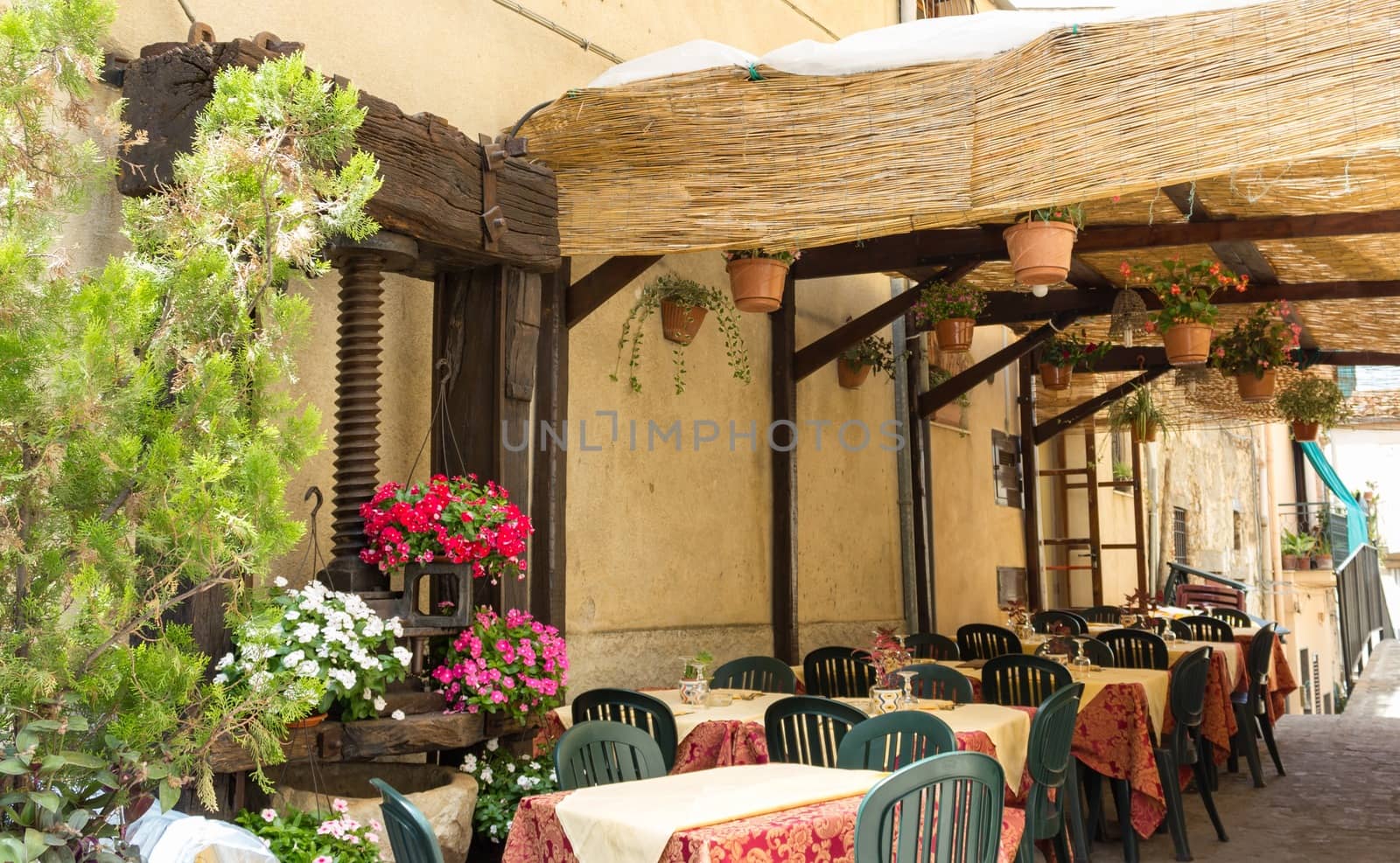 typical summer restaurant with outdoor courtyard for intimate romantic encounters 