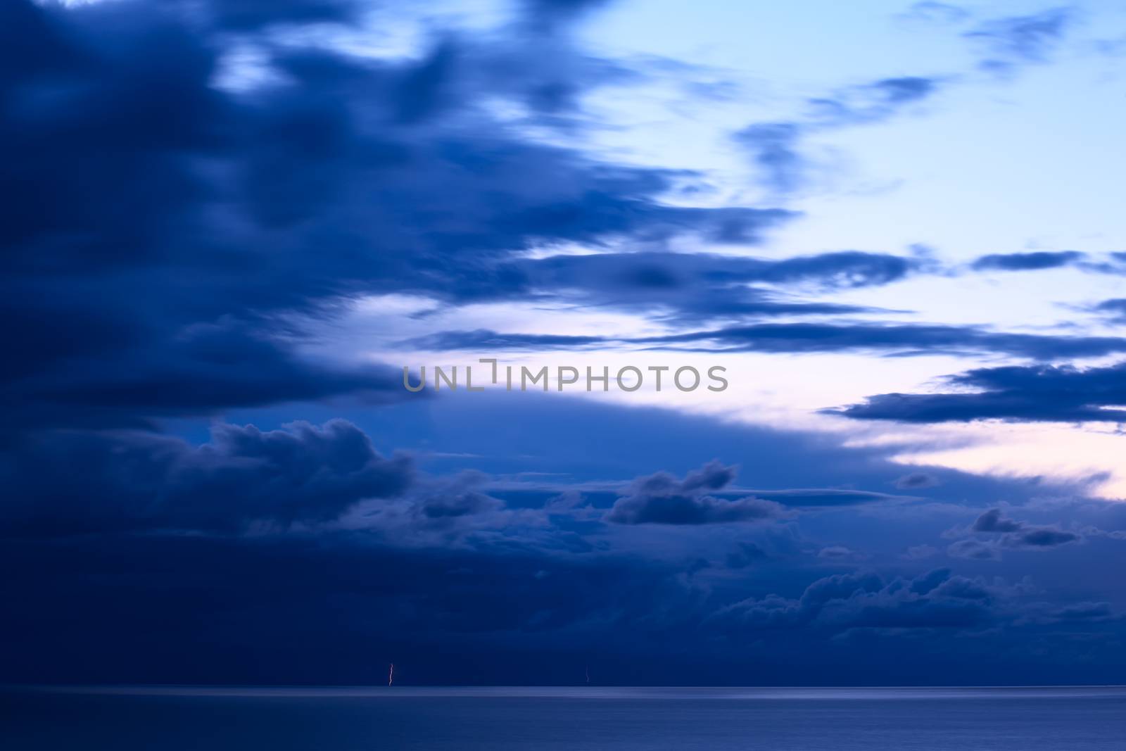 Storm clouds and lightning over Lake Titicaca viewed from the small tourist town of Copacabana in Bolivia