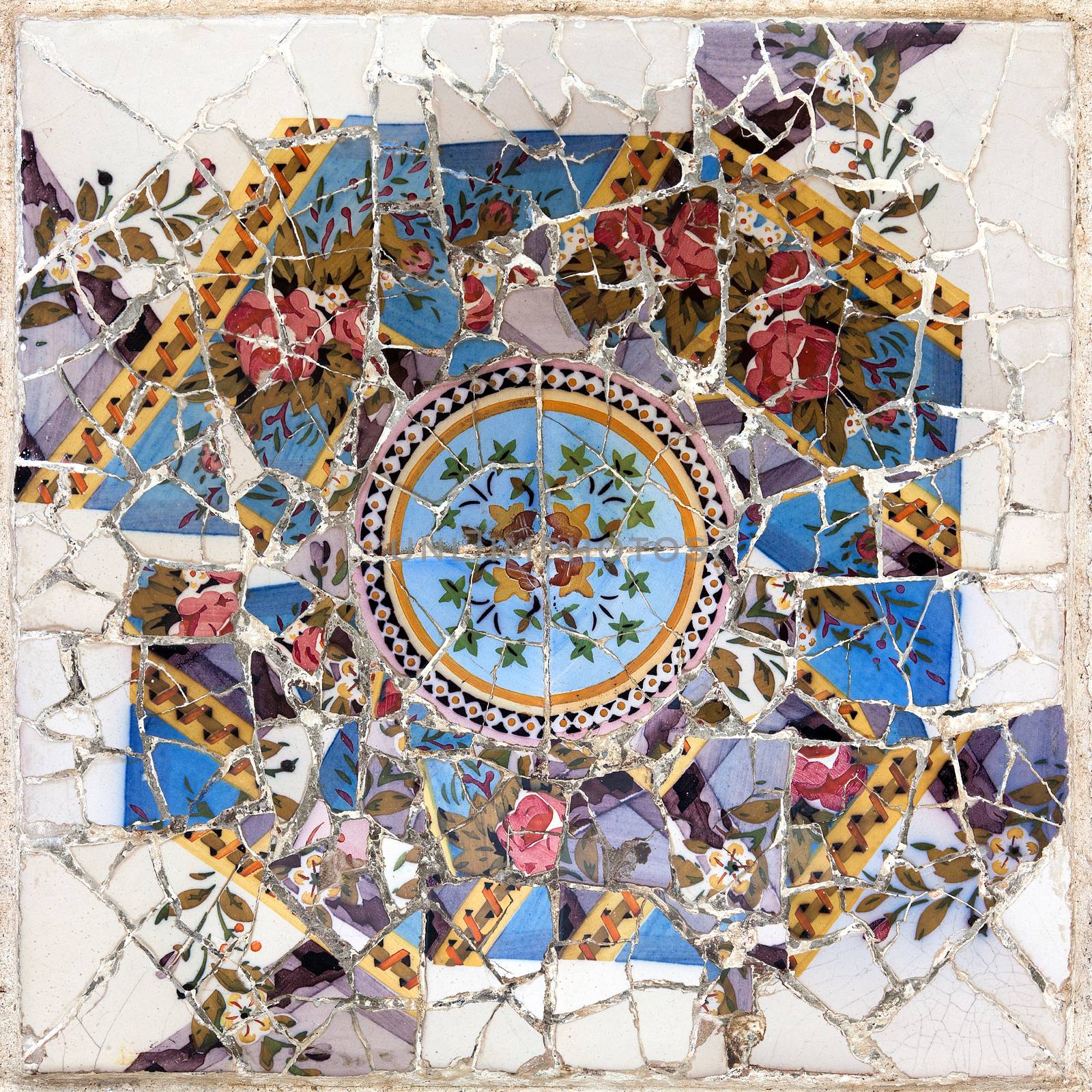 BARCELONA, SPAIN - APRIL 16: Colorful mosaic in famous Parc Guell on April 16, 2012 in Barcelona, Spain. It is part of the UNESCO World Heritage Site "Works of Gaudi", major Spanish landmark.
