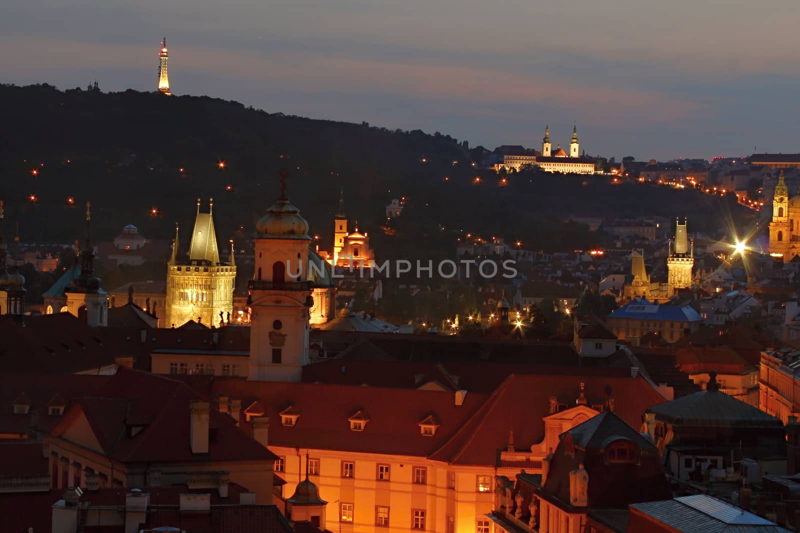 Photo shows details of Prague city at night.