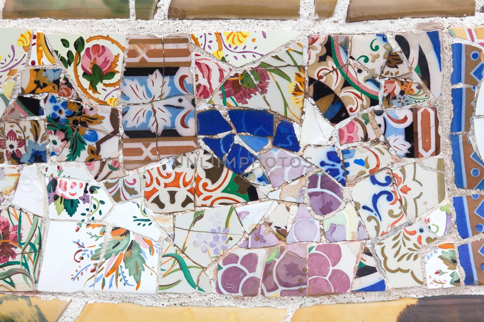 Park Guell is a garden complex with architectural elements situated on the hill of El Carmel in the Gracia district of Barcelona, Catalonia, Spain. It was designed by the Catalan architect Antoni Gaudi and built in the years 1900 to 1914. It is part of the UNESCO World Heritage Site "Works of Antoni Gaudi".