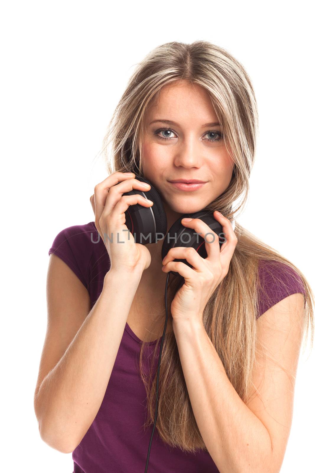 Young woman listening music with headphones