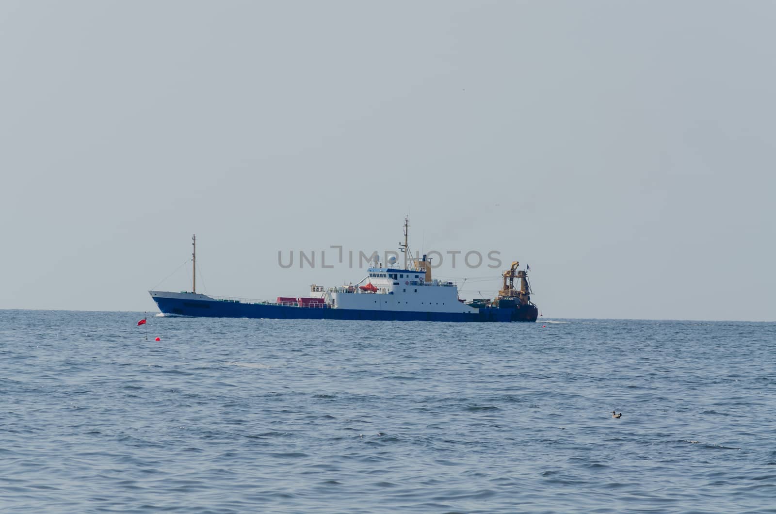 Fishing fleets boat waiting for the tide to entering port.