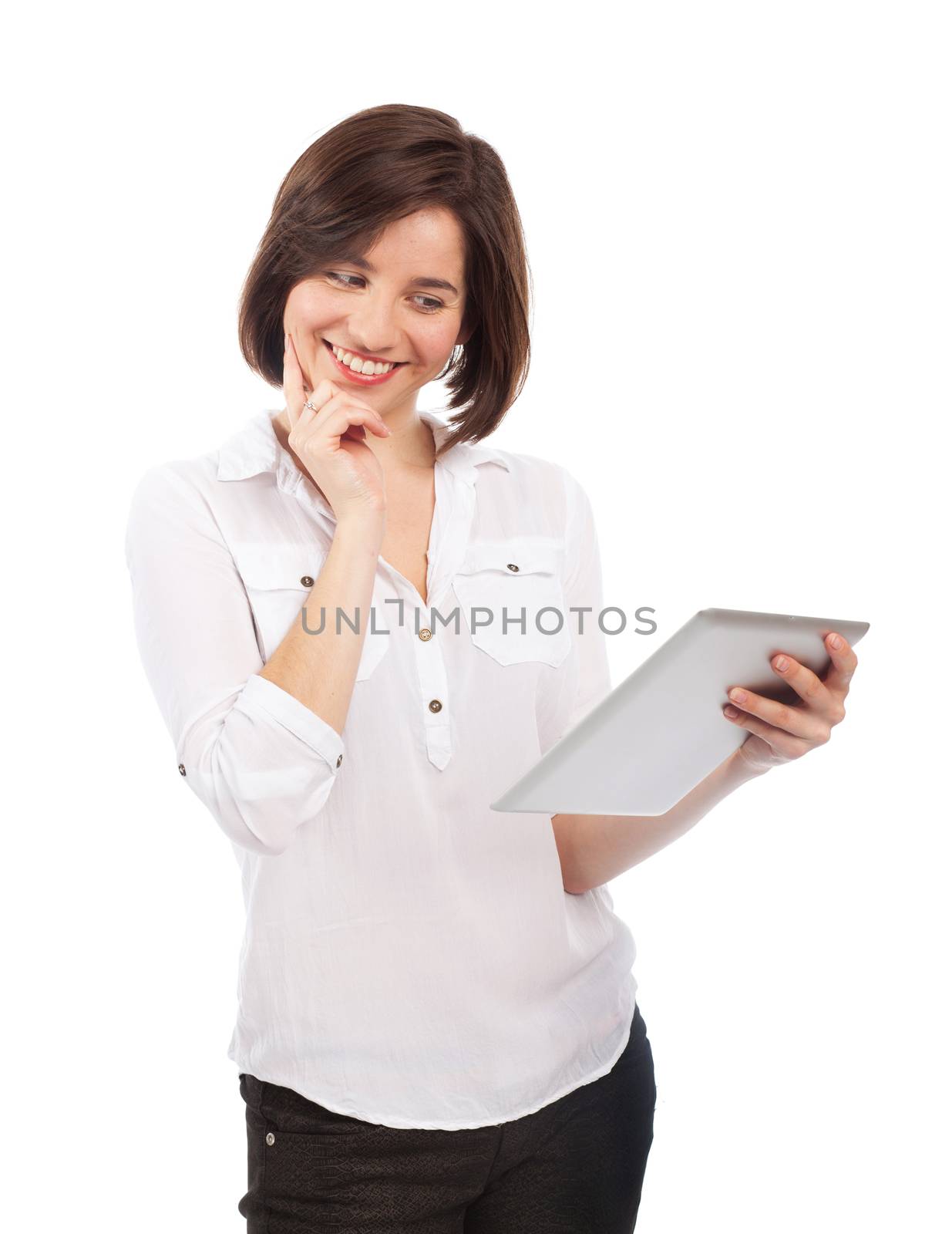 Smiling woman reading on a touchpad by TristanBM